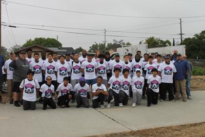 Kaiser football players help their community by volunteering for Park