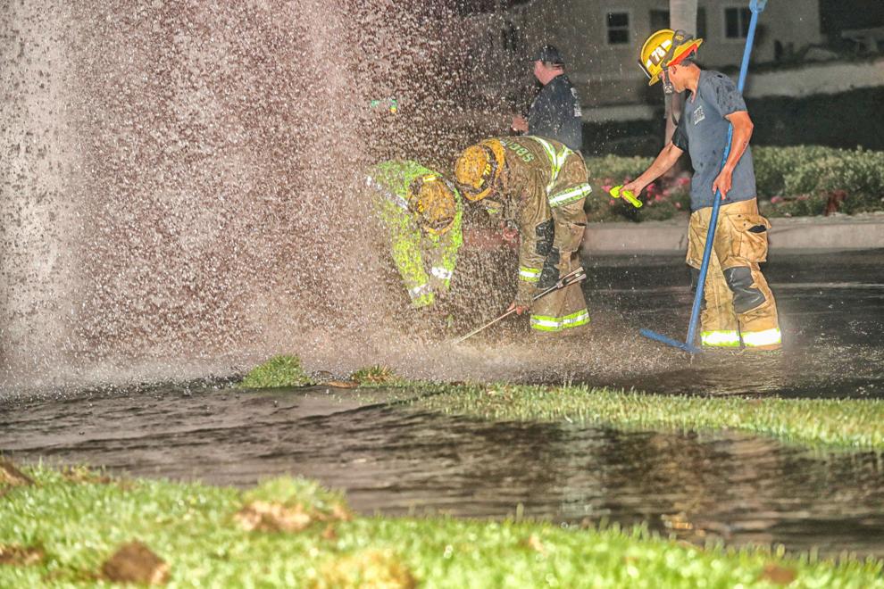Car hits fire hydrant, sending water high into the air in Fontana