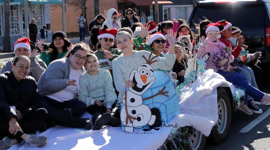 Thousands of residents enjoy Fontana Christmas Parade despite strong