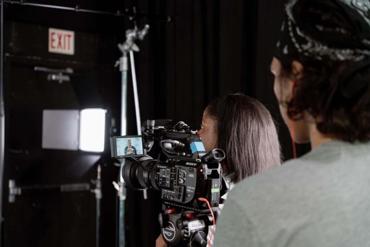 Image of students using film equipment