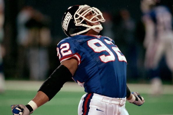 New York Giants Michael Strahan reacts to a sack in week 13 at Giants  Stadium in East Rutherford, New Jersey on December 4, 2005. The New York  Giants defeated the Dallas Cowboys