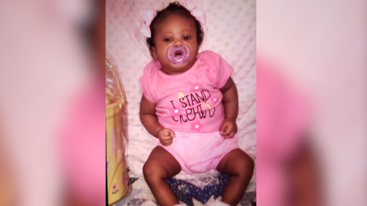 AI generated Portrait of funny African American innocent baby peeking out  from under covers in bed, pretty little child with big black eyes looking  at camera 40176839 Stock Photo at Vecteezy, image size:1280x720