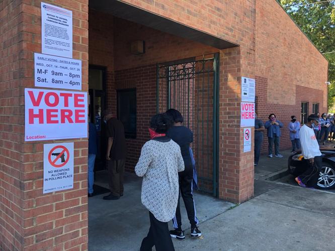 PHOTOS Long lines at polls as early voting kicks off across Tennessee