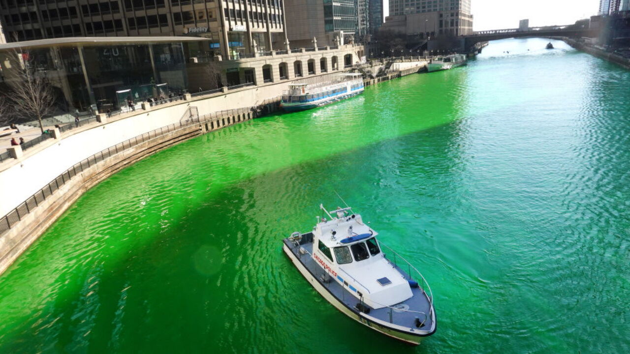 Chicago surprises the city with the traditional green river for St. Patrick's  Day after saying the event was canceled