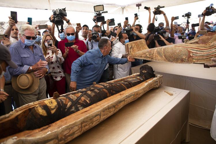 Photos: Egypt displays 59 ancient coffins recently discovered near ...