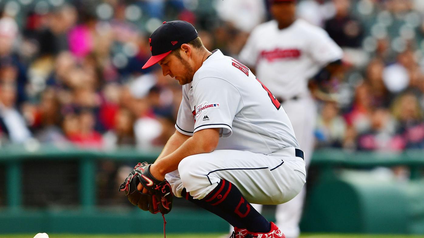 Trevor Bauer: Indians pitcher throws ball over outfield fence in anger