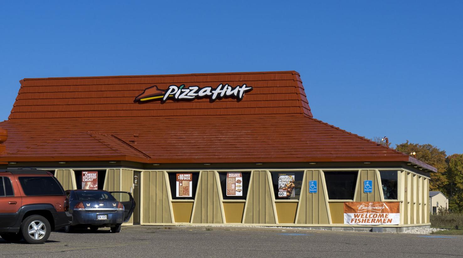 Police: Car crashes into Pizza Hut’s roof, catches fire | Trending ...