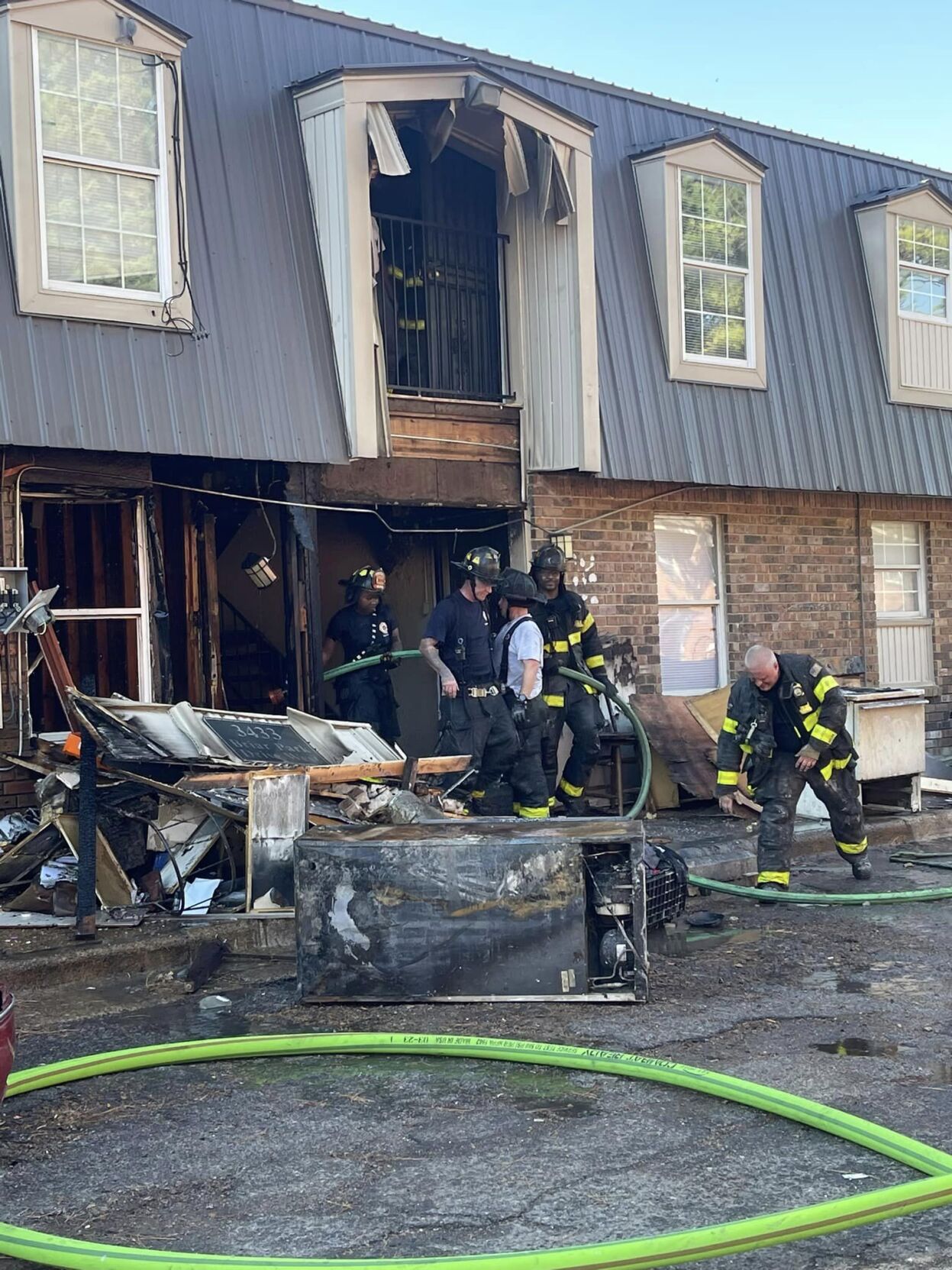 PHOTOS: MFD Battles Two-story Apartment Fire That Left Four Homes ...