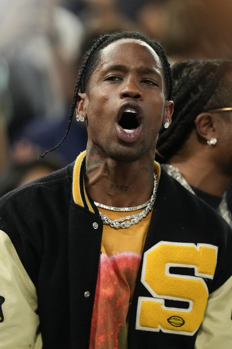 Travis Scott spotted wearing Sand Springs letterman jacket at 2024