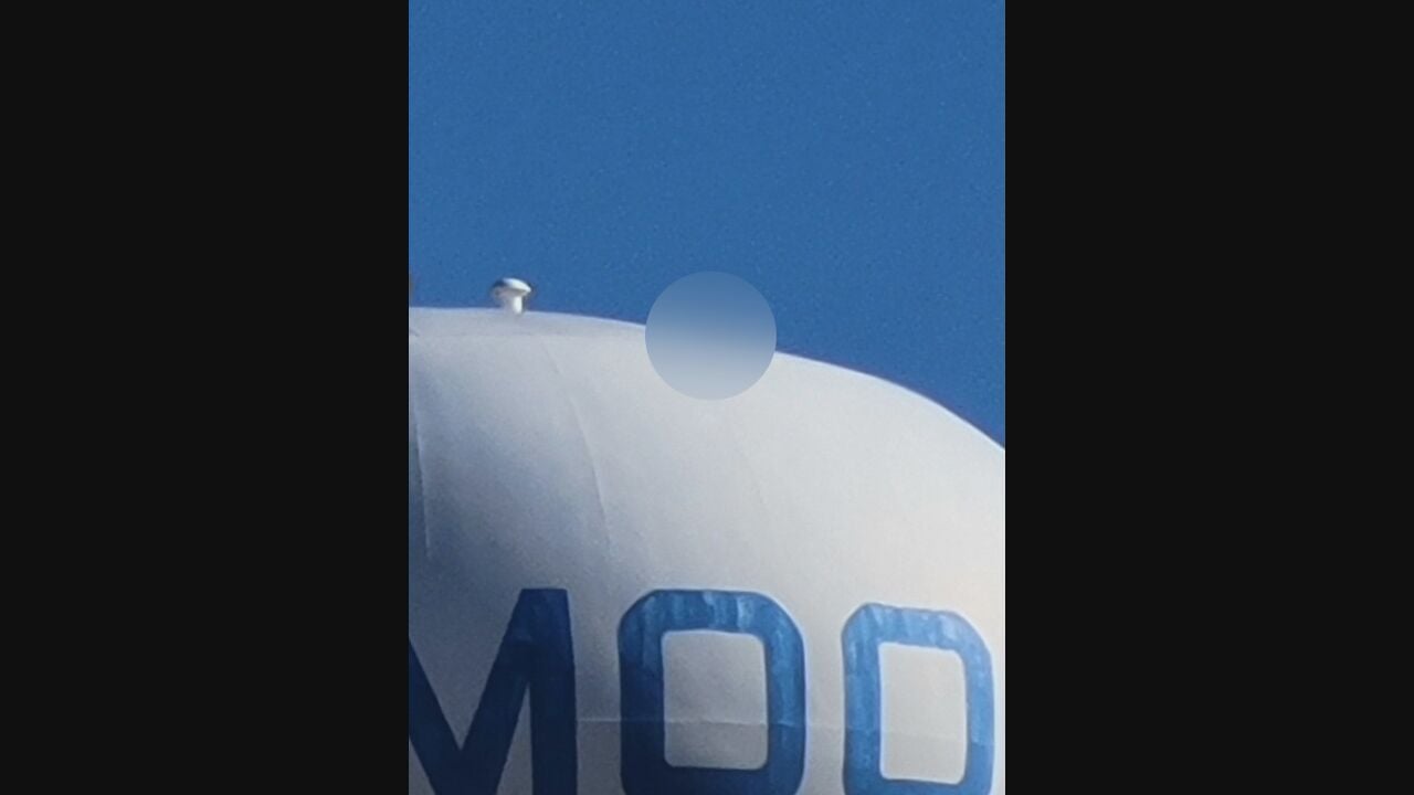 Drone drops adult toys on Moore water tower and street lights