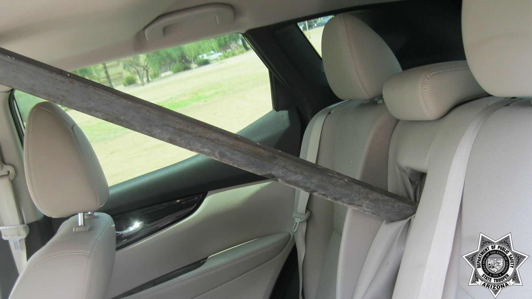 Metal beam spears woman s windshield embeds into seat inches from