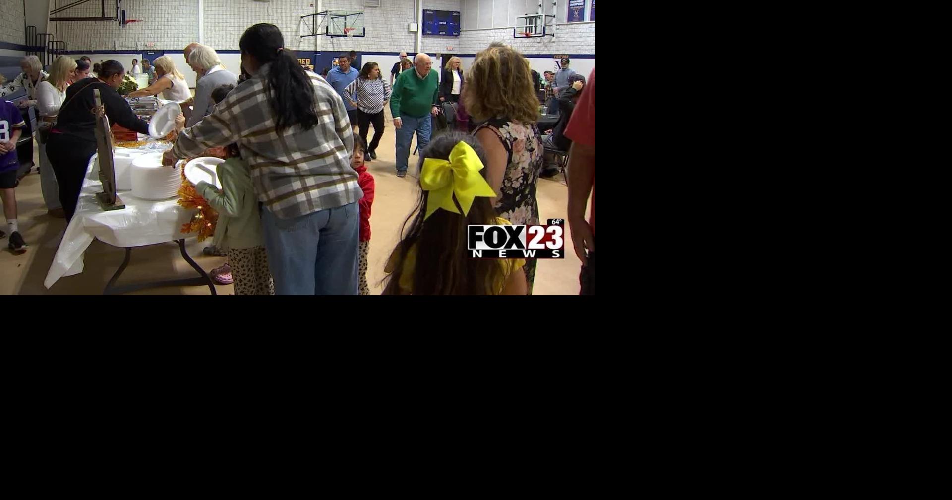 Local Catholic church hosts Thanksgiving dinner event featuring dishes from around the world