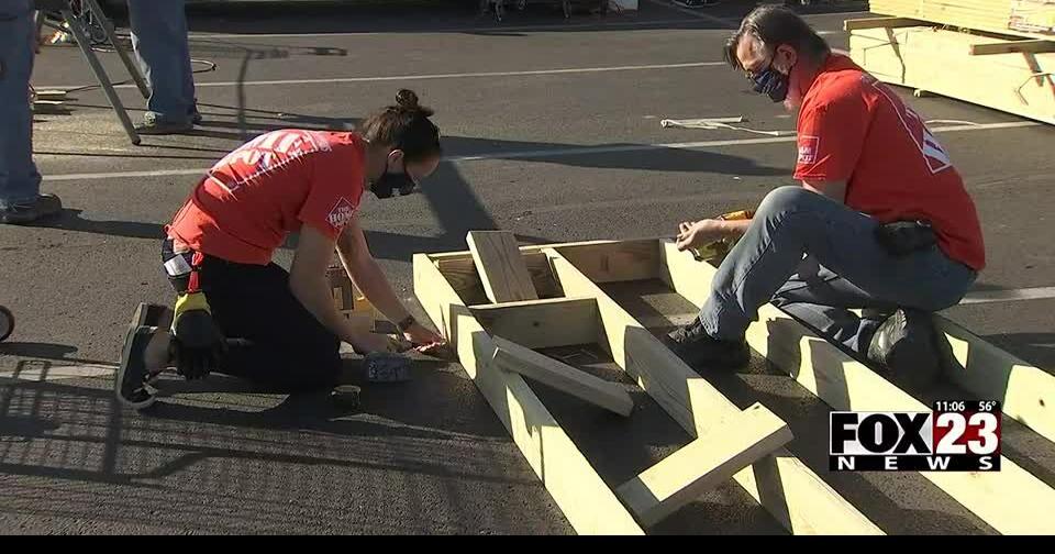 Volunteers building wheelchair ramps in south Tulsa for those in need