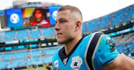 Panthers' Christian McCaffrey presents Marine with nearly 30 years