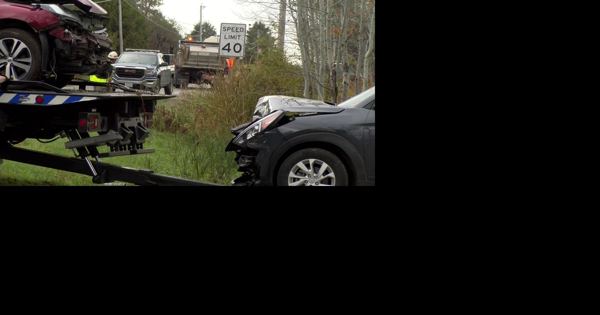 Car passes construction flagger into oncoming traffic causing a crash ...