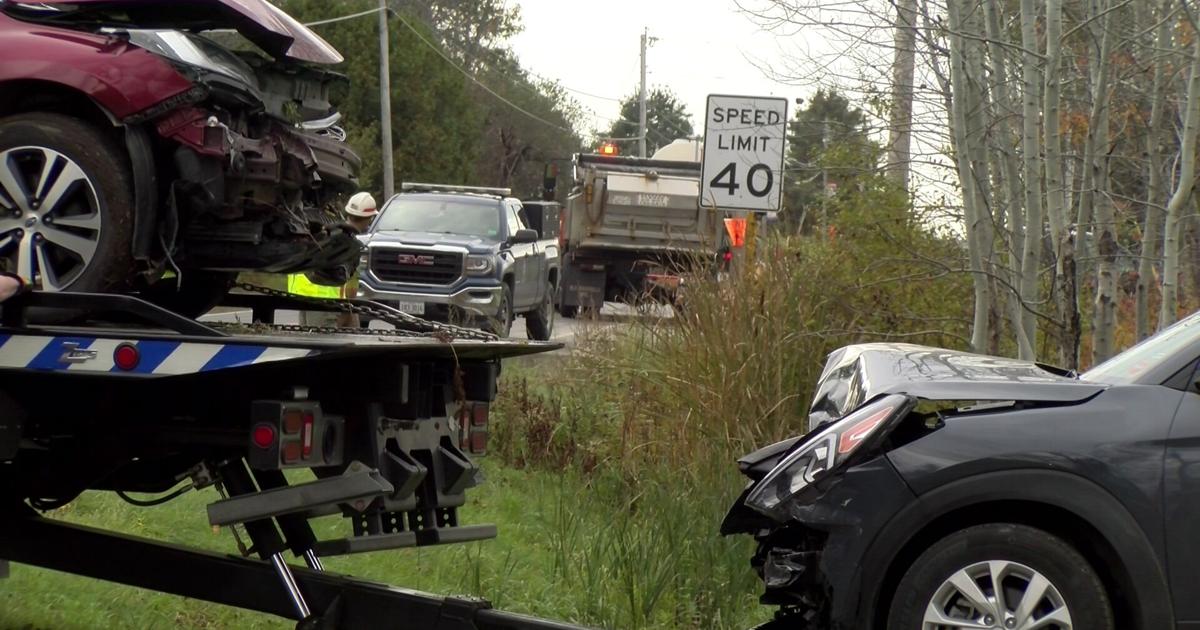 Car passes construction flagger into oncoming traffic causing a crash ...