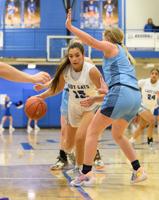 Lady Cats finish 13th District play undefeated