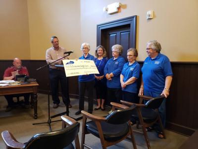 Fiscal Court receives check from Simpson County Homemakers