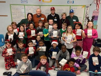 Rotary Club gives out dictionaries at SES