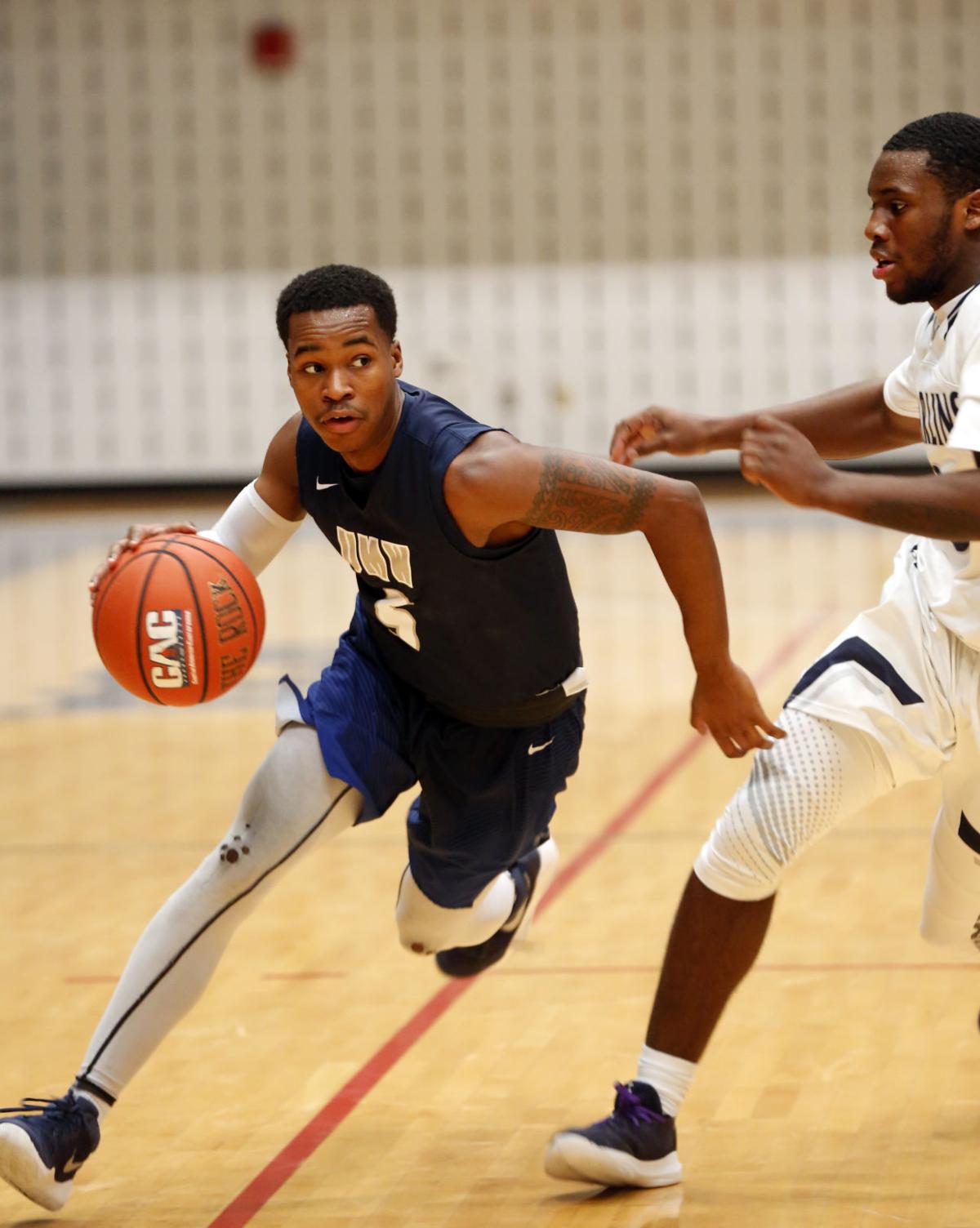 Umw Men S Basketball Eagles Prey On Marlins From 3 Point Line