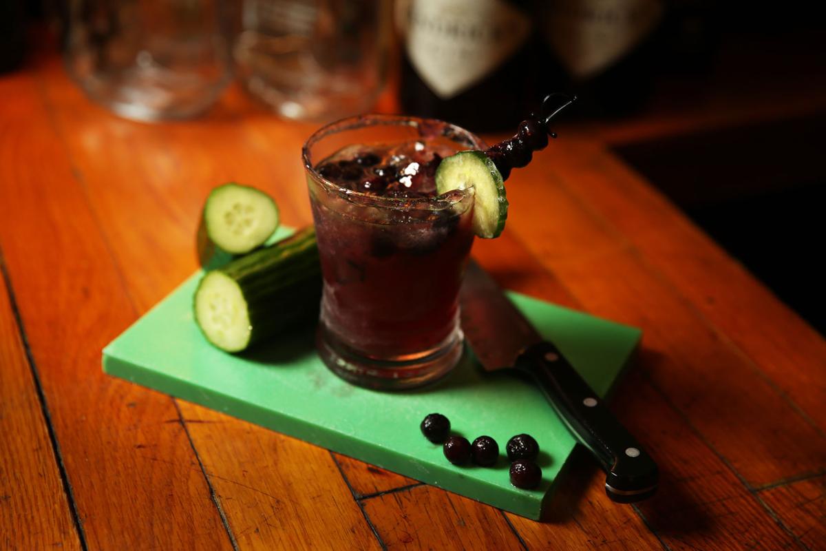 The Log Cabin mixes up a cucumber blueberry gimlet ...