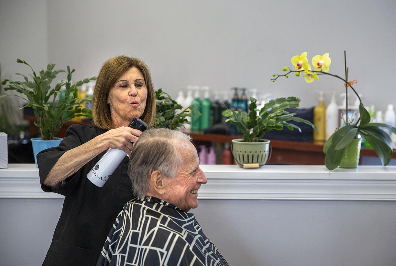 'Delightful hairdresser' puts away scissors after 54 years