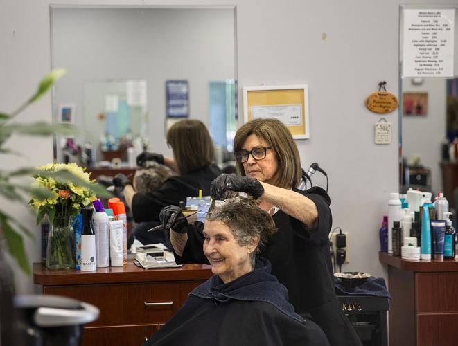 'Delightful hairdresser' puts away scissors after 54 years