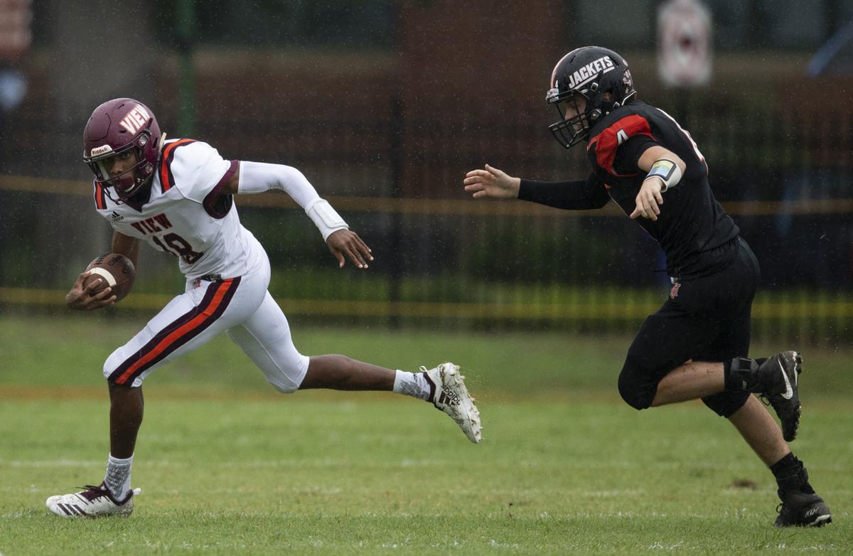 High school football Mountain View uses wet conditions to its