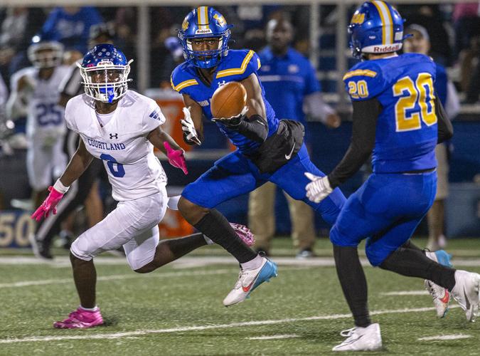 High school football King digs deep to deny Courtland's upset bid