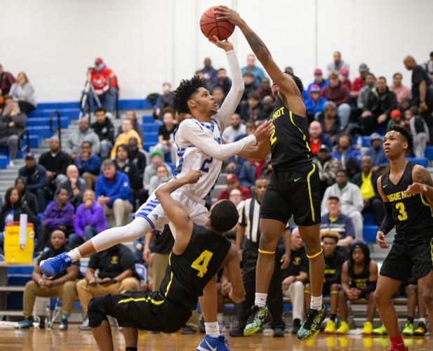 Region 4B boys basketball semifinal Courtland defeats Huguenot