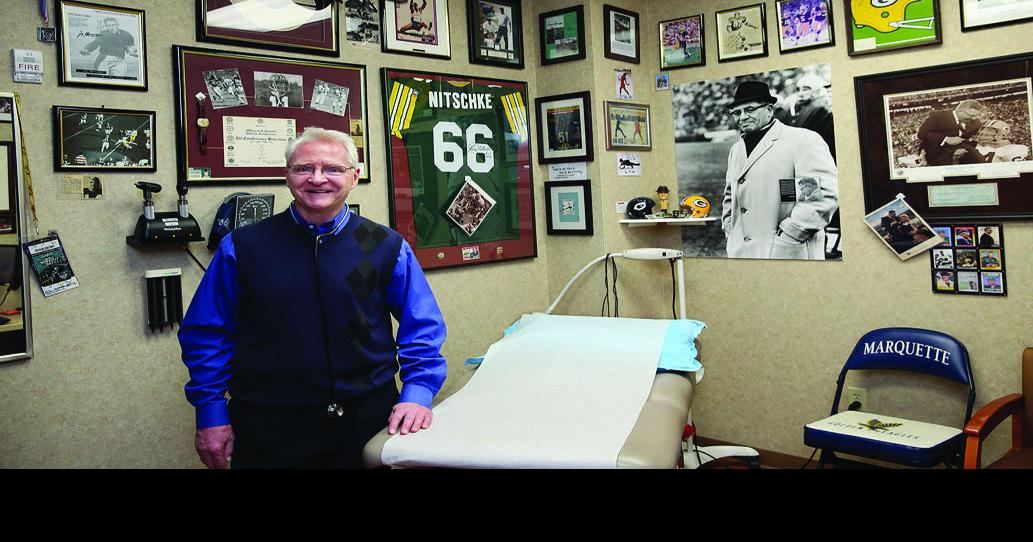 Doctor tries to put patients at ease with sports memorabilia