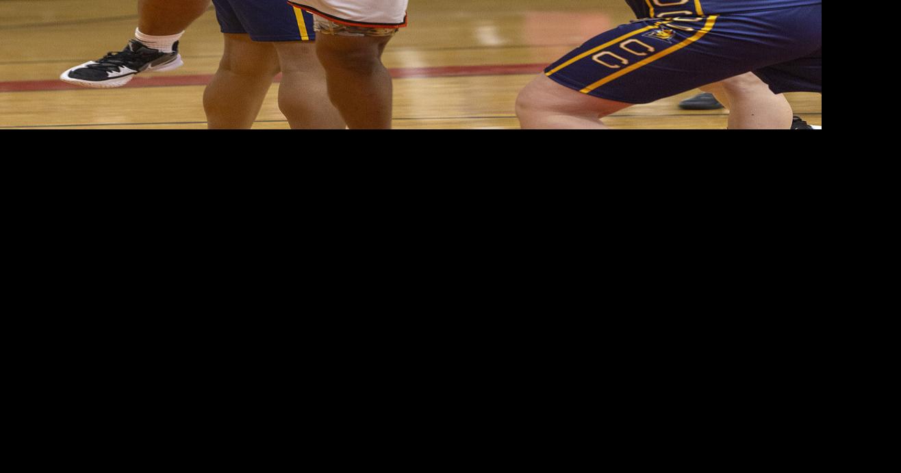 Girls' basketball James Monroe shows it can play 'team ball', rallies