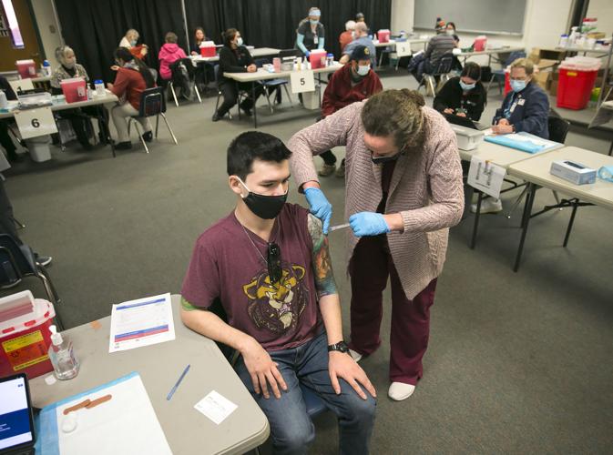 Second COVID shot can bring aches and chills, but health experts say it