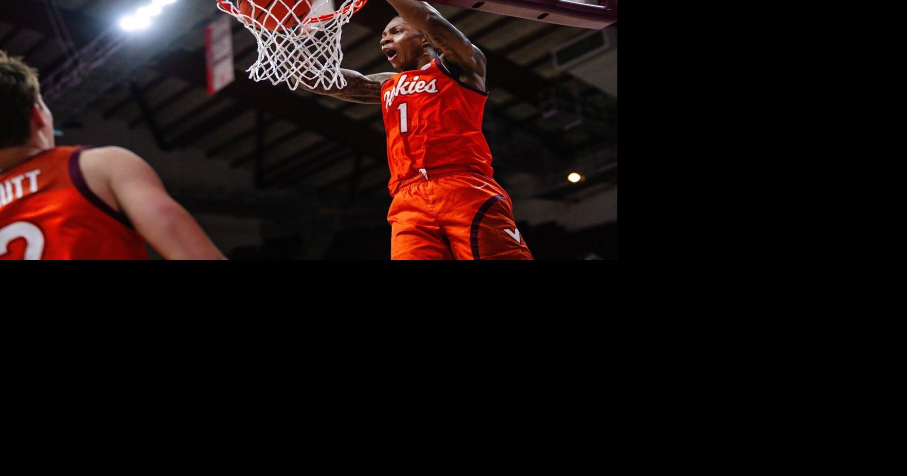 Virginia Tech's Young shares in Tobi Lawal's draft night