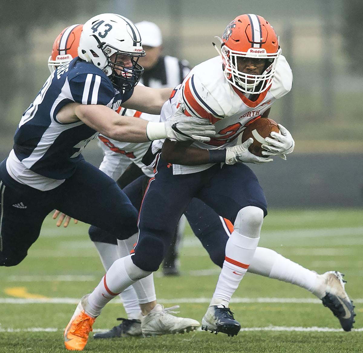 High school football, Class 5 semifinal: Early deficit, injuries hamper