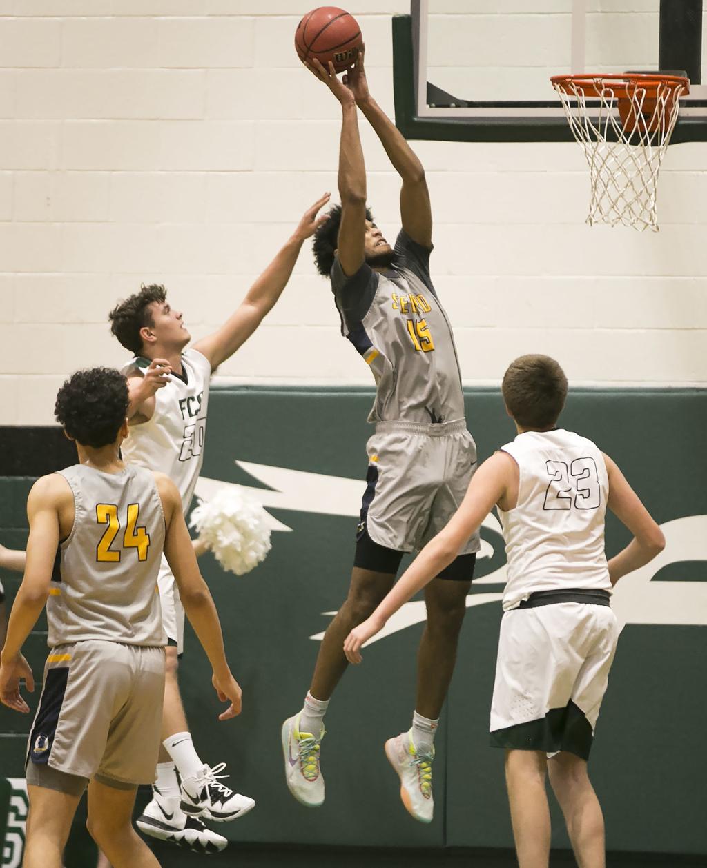 High School Boys Basketball 7 Footer Reid Leads Steward Past