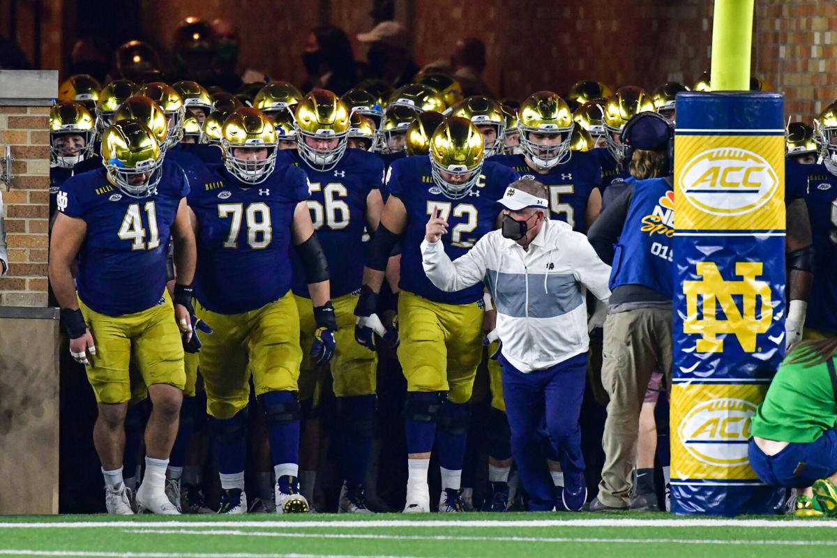Notre Dame head coach Brian Kelly leads his team out of the tunnel before a game against Clemson at Notre Dame Stadium on Nov. 7, 2020, in South Bend, Indiana.