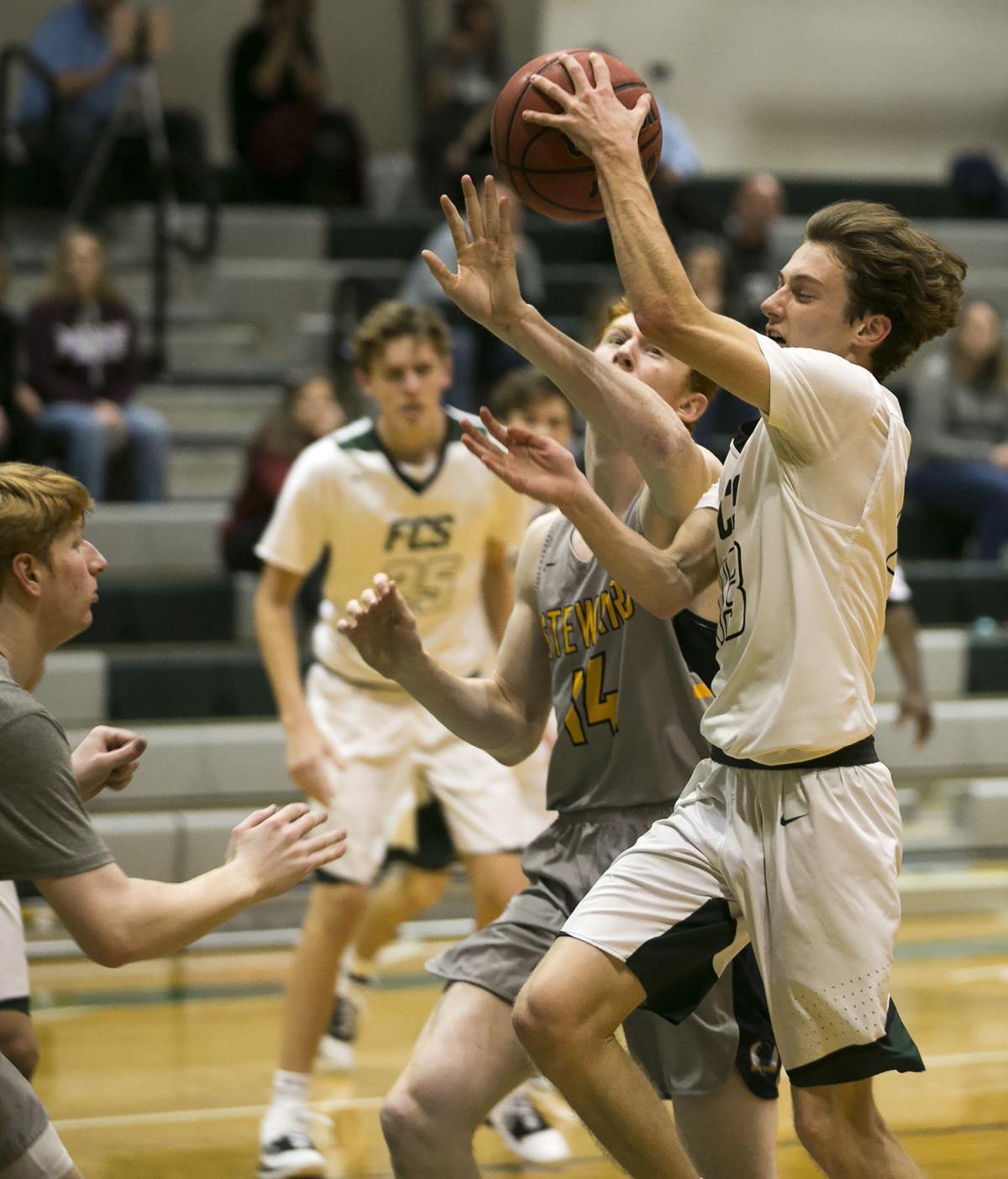 High School Boys Basketball 7 Footer Reid Leads Steward Past