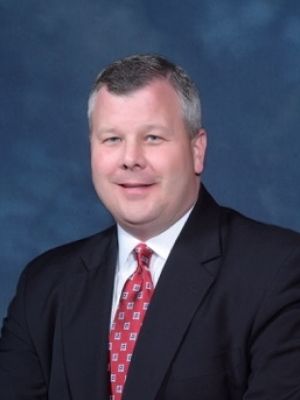 John Nicholls - President