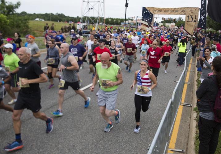 Cheers, cowbells encourage runners in Sunday's Marine Corps Historic