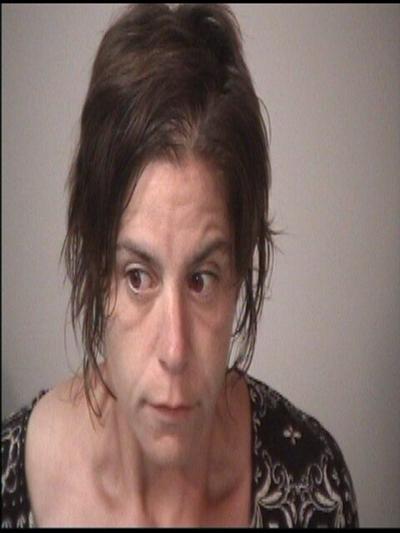 Woman charged with burning occupied city dwelling denied bond