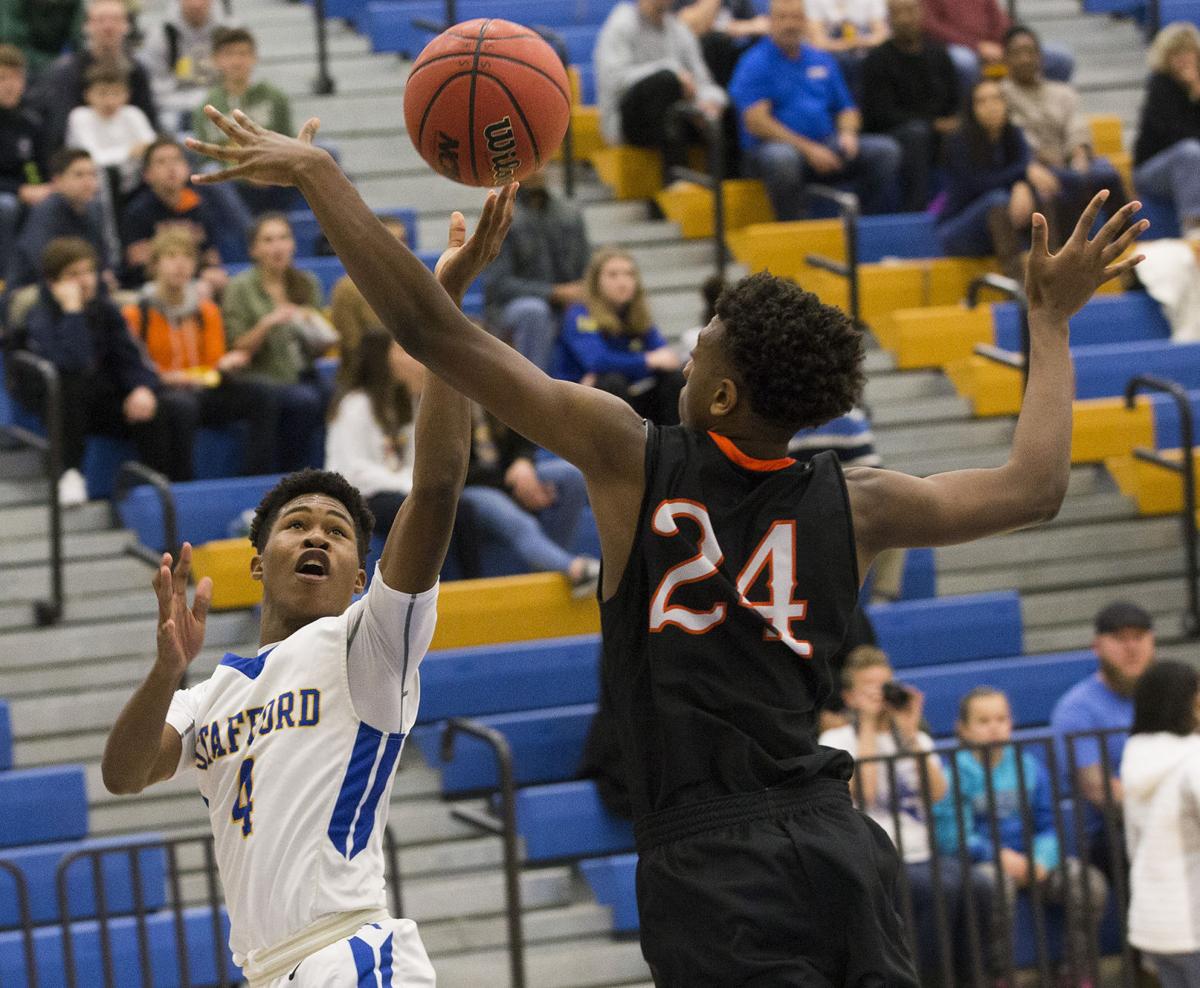 Boys basketball Stafford gives Lively win in début at alma mater