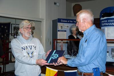 USS TAPPAHANNOCK: Veteran presents talk, cruise book at Essex County Museum