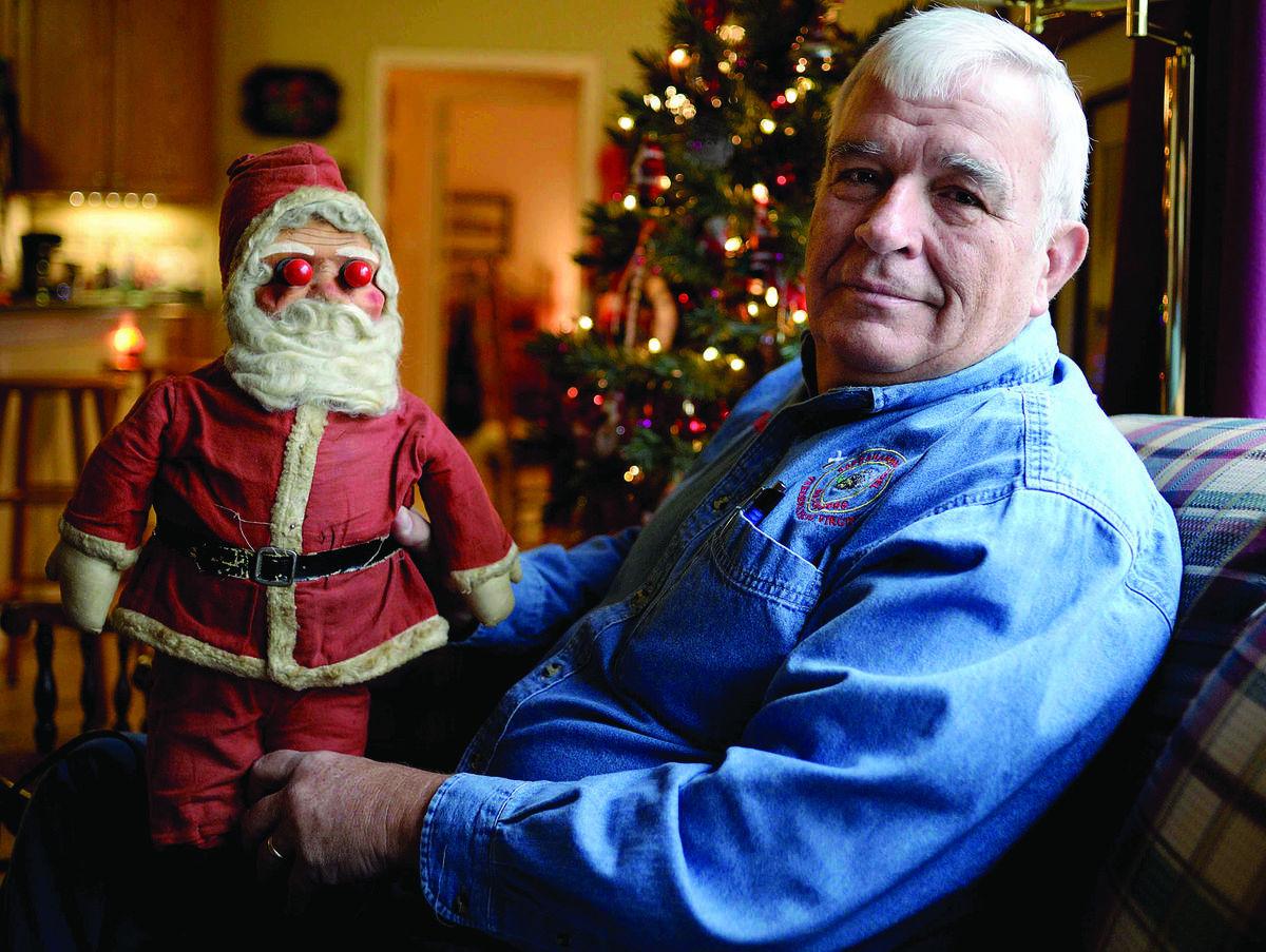 Old Santa Claus doll is blinking for new generation