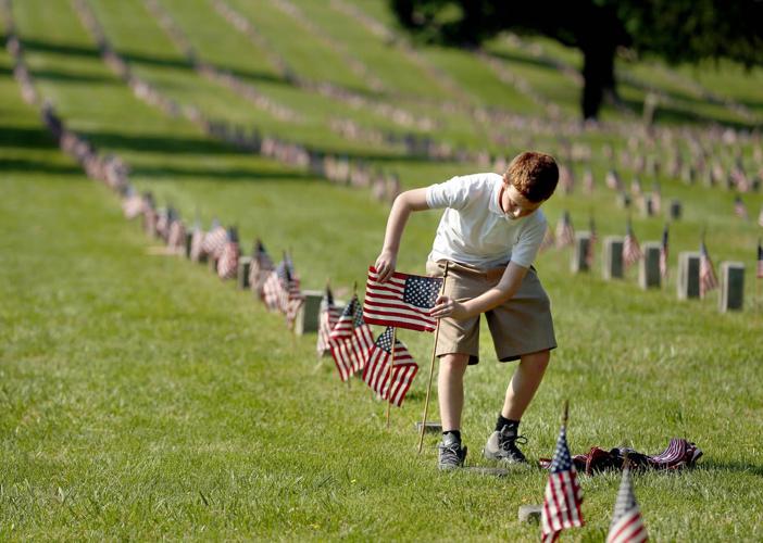 Fredericksburg Christian School students demonstrate a 'sense of caring' at national cemetery