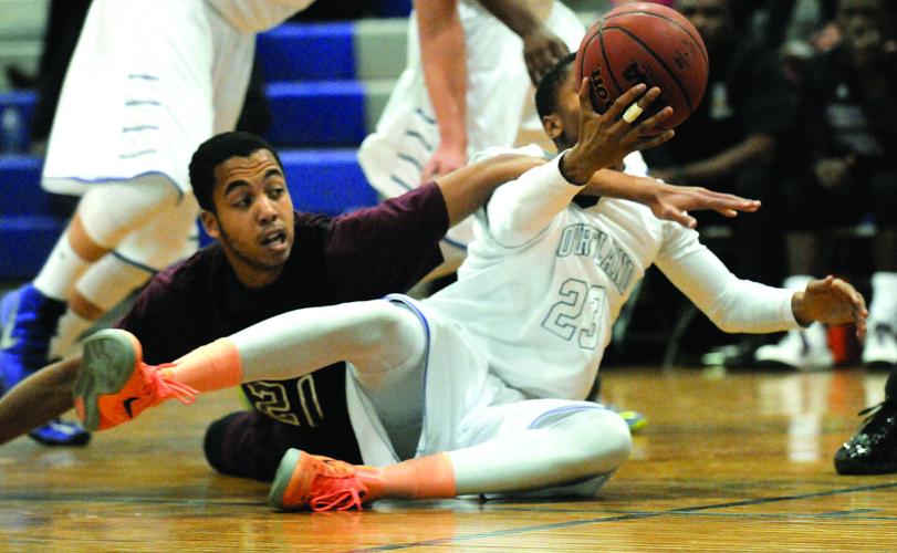 High school boys basketball Courtland slogs way to victory