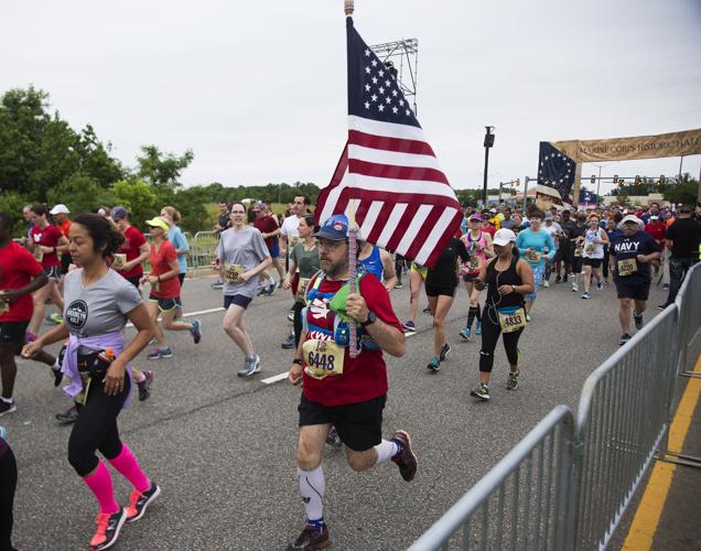 Cheers, cowbells encourage runners in Sunday's Marine Corps Historic