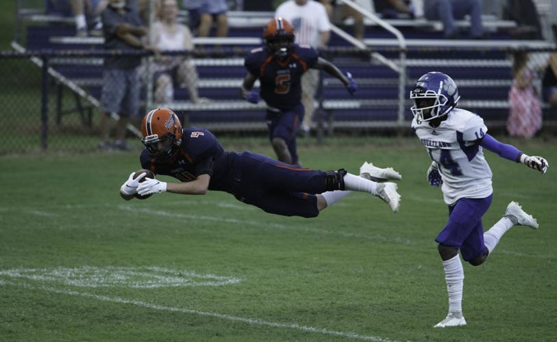 High school football Behind Poirier, Orange takes early lead, then