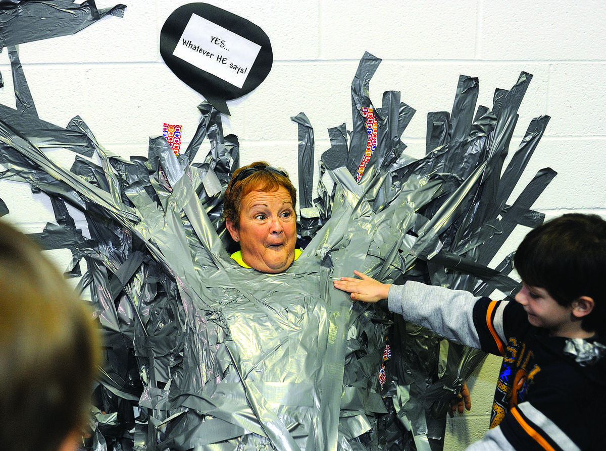 School leaders duct taped to wall raise more than expected