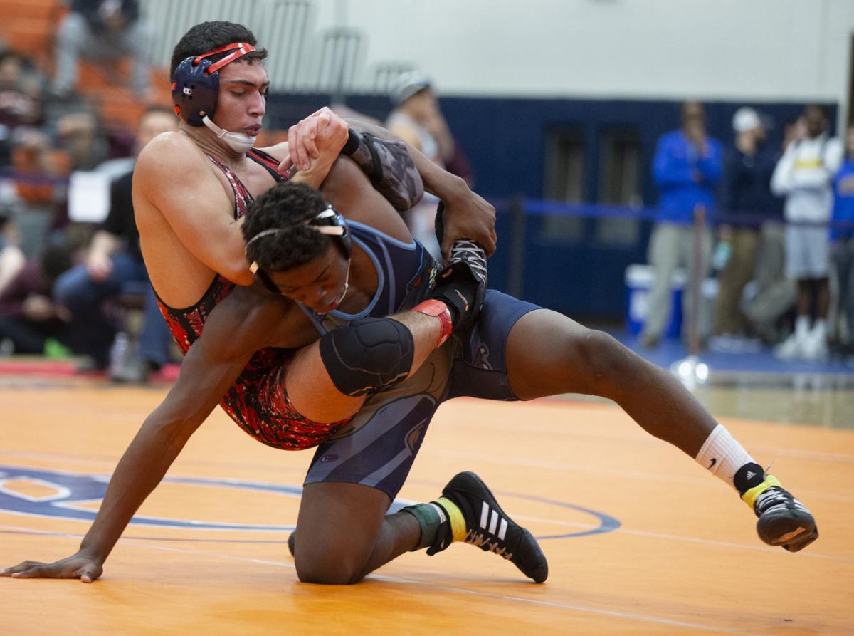 High school wrestling: Brooke Point wins Region 5D meet for coach and ailing son ...